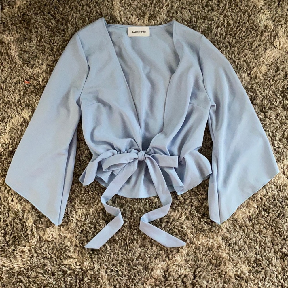 Plunging ruffle tie bell sleeve baby blue top